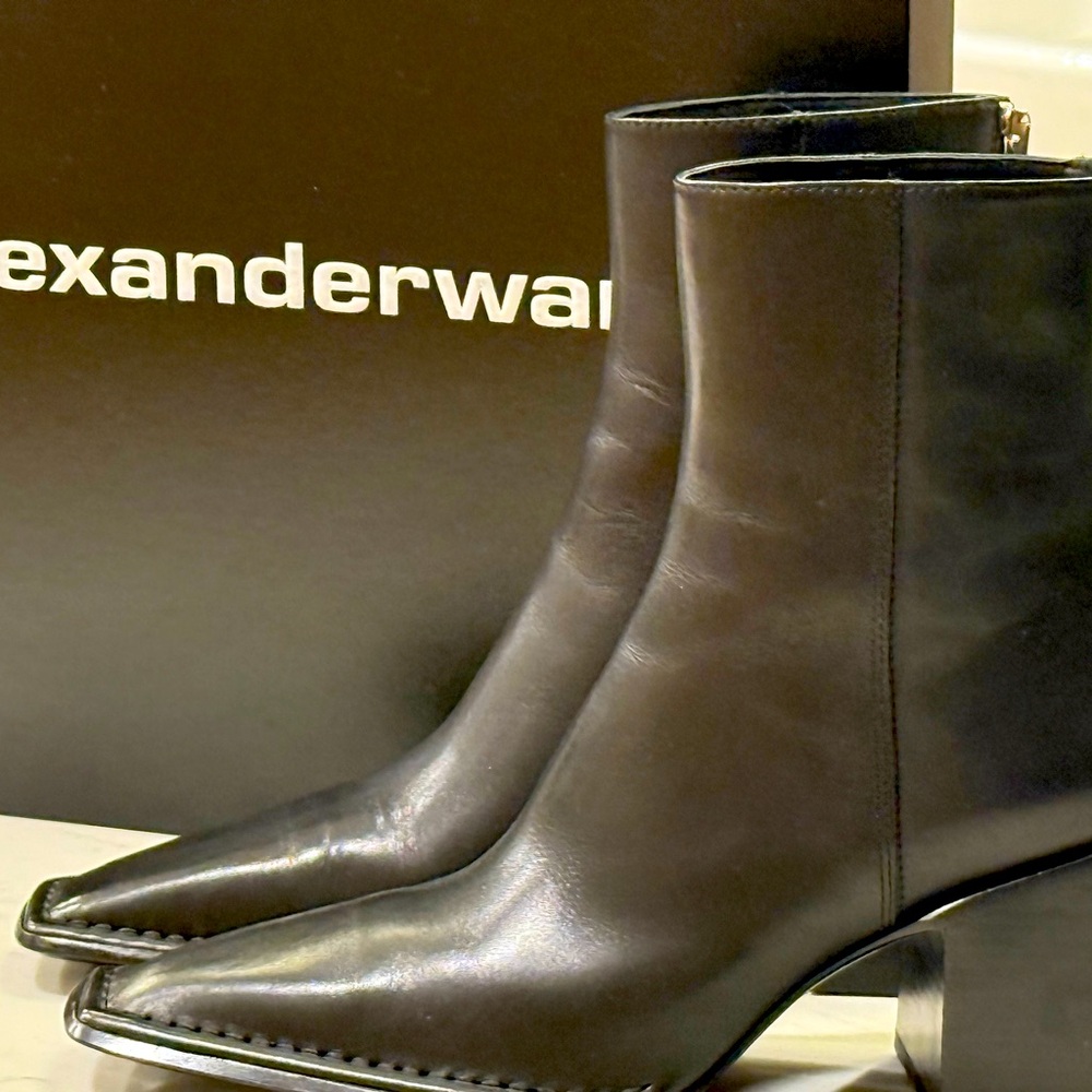 Black leather boots. New. Size 36.5